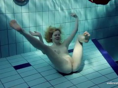 KiloTop presents: Blonde goes for a swim and strips