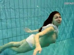 KiloTop presents: Girl in white panties swims in pool