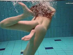 KiloTop presents: Underwater with a busty naked babe as she swims