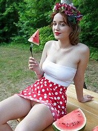 KiloTop presents: Nice belarusian stunner Rokki removes all clothes on a blanket in a backyard